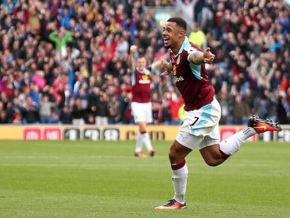 Andre Gray celebrates his goal against Liverpool
