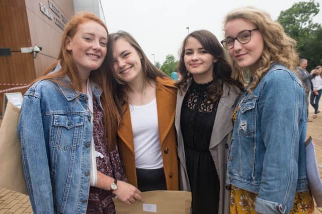 Blessed Trinity pupils celebrate receiving their GCSE results. Photo: Andy Ford