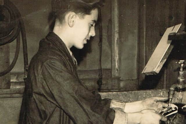 A young Eddy Rawlinson at work in Bull Street