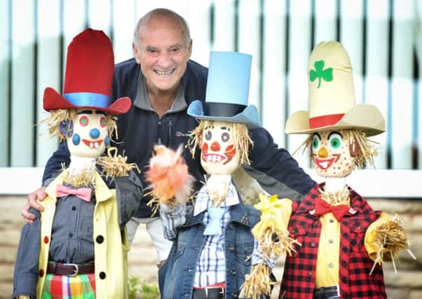 Picture by Julian Brown 27/08/16

Brian Walker with his Diddymen

Higham Scarecrow Festival