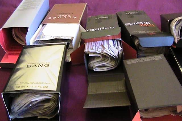 Some of the money hidden in aftershave boxes