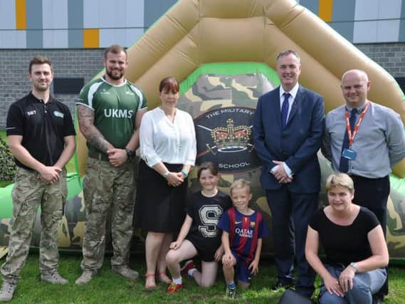 (From left to right):UK Military School's Sam Taylor and Greg Dennings; Alicia Foley; Ellie Small; Jake Pennington; Lancashire Police and Crime Commissioner Clive Grunshaw; Warburtons' Gary Dugdale; and Fiona Crutchley, from Lancashire County Council.