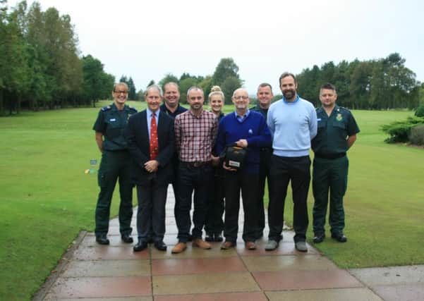 Back row paramedic Laura Bedford, Mark Evans, Clinical Service Manager for the North West Ambulance Service, paramedic Lois Newton, who was first on scene in the Rapid Response Vehicle, Ian Barton, Operations Manager and Jason Whalley, Emergency Medical Technician 1 (EMT1).
Front row Dave Johnson, Captain of Clitheroe Golf Club, Andrew Blockeel, Chris Ennis and Mark Schofield.