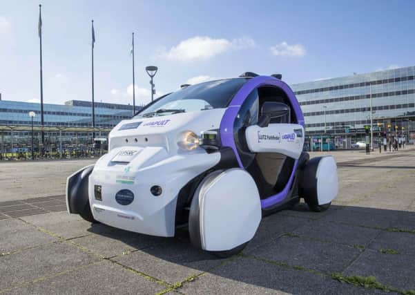 The UK's Transport Systems Catapult self-driving vehicle travelling around Milton Keynes, during a successful test-drive in public for the first time