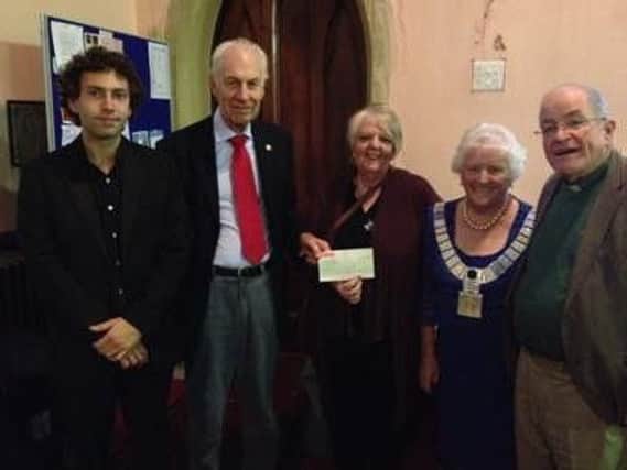 Pictured at the Nazareth Unitarian Chapel in Padiham are (from left to right) Harry Nowakowski-Fox , concert organiser Barry Brown, Freda Whittle from North.West Air Ambulance Mayor of Ribble Valley Mayor  Coun. Joyce Holgate, and the Minister Rev Jim Corrigall. (s)