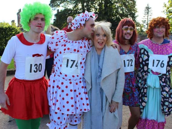 Dames on the Run winner Ian Cock (far left) with Sherrie Hewson and his colleagues from Veka