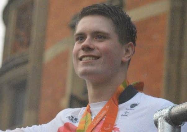 Tom Hamer during the welcome home parade in Manchester. Photo: Denise Foulds