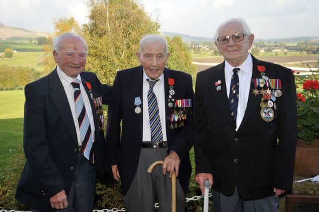 from left, Denis Macro, Robert Alwyn Taylor and Edward John Shipley from Colne receive their Legion d'Honneur from the French Consul