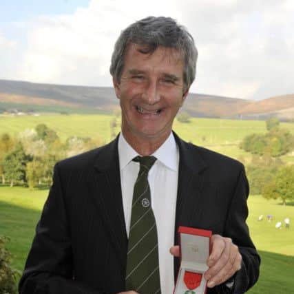 Kevin Brown with the Legion d'Honneur he received for his father Alan Crawshaw Brown