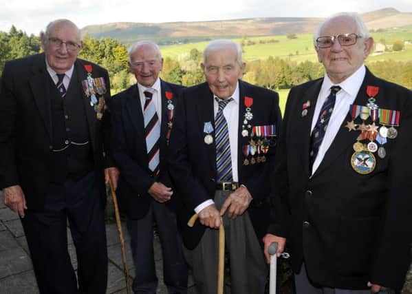 from left, Norman Fred Robinson, Denis Macro, Robert Alwyn Taylor and Edward John Shipley receive their Legion d'Honneur from the French Consul