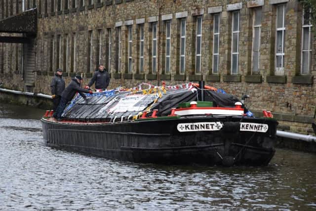 Kennet passes Brierfield Mill on its 200th birthday journey along the Leeds and Liverpool Canal. Photo: Eddie Bobrowski