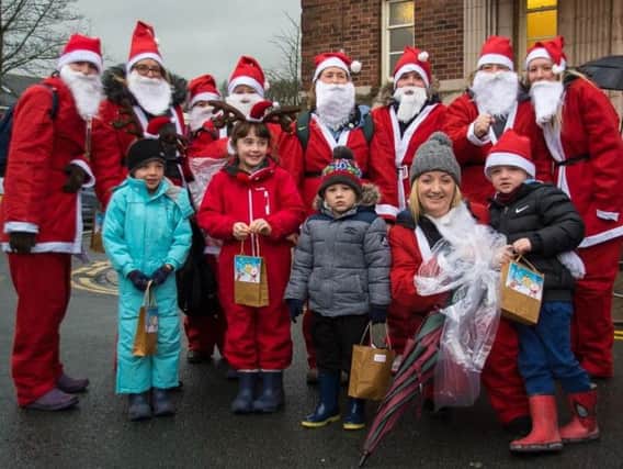Families get into the festive spirit for last year's Winter Wander