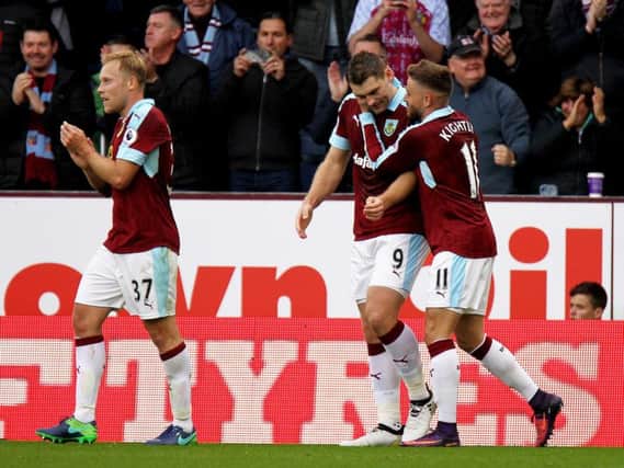 Sam Vokes celebrates the opener with Michael Kightly
