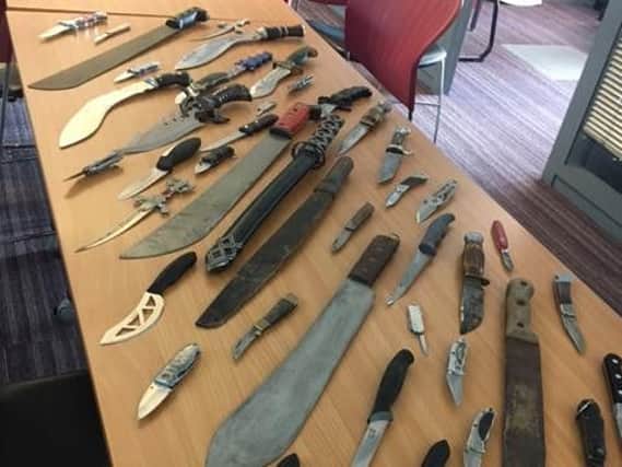 A selection of knives that were handed in