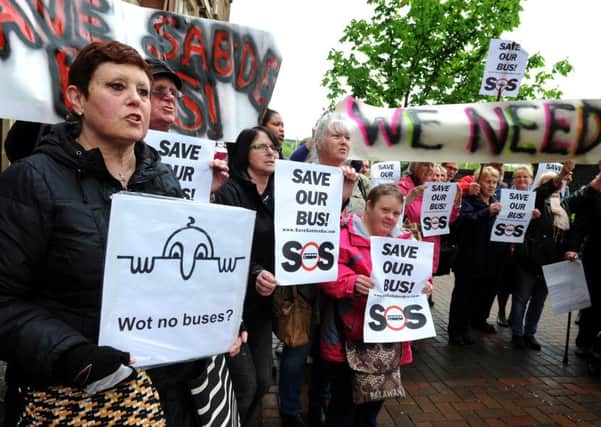Dozens of residents of Sabden demonstrating outside County Hall, Preston, in May this year after their one and only bus service was axed. Picture by Paul Heyes.