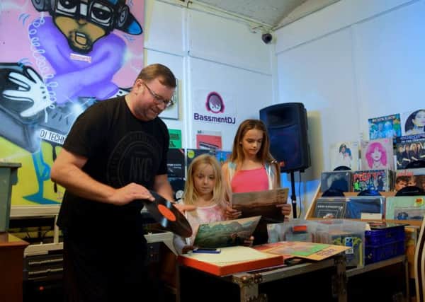 Andy Aindow introduces youngsters to vinyl at Bassment Rare Records (s)