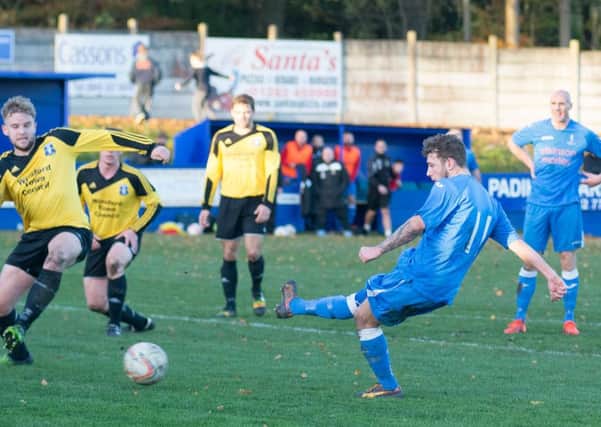 Kieron Pickup scores for Padiham against Winsford United										Pictures: Rob Moss