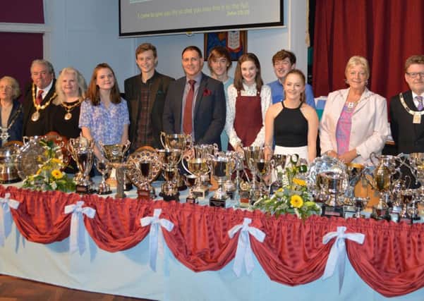 Local dignitaries and guest of honour, with Gareth Bowden (centre), along with some of our prize winners at St Augustine's RC High School's awards evening.