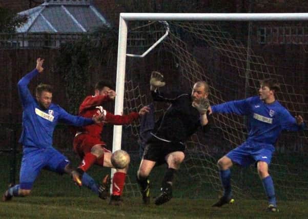 John Beckwith has a shot saved against Cammell Laird			Picture: Peter Naylor