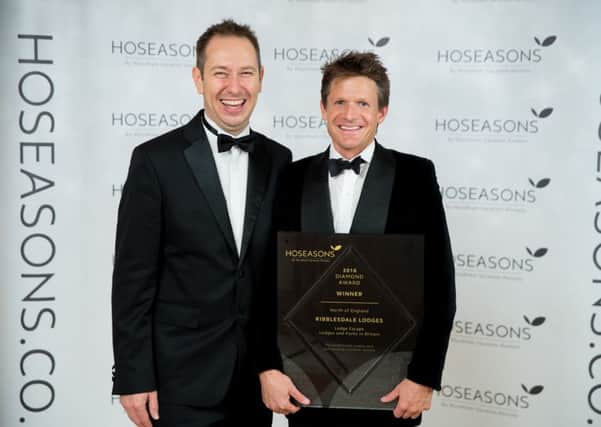 Mark Warnes, Property and Portfolio Director, Hoseasons (left) with Ribblesdale Lodges owner Guy Hindley and his award. Photo by Darren Cool.
