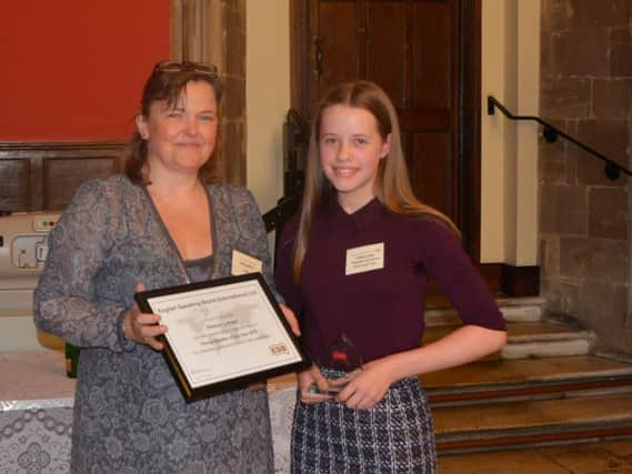 Blessed Trinity Roman Catholic College's Eleanor Latham, 14, has been recognised for her utstanding spoken language skills.