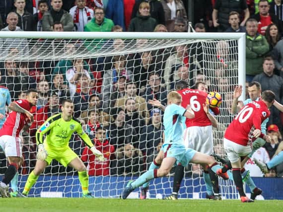 Wayne Rooney shoots on goal during the recent 0-0 draw at Old Trafford