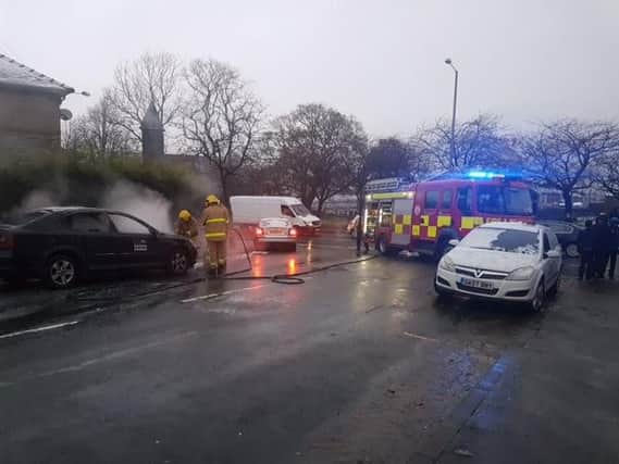 Firefighters tackle vehicle blaze