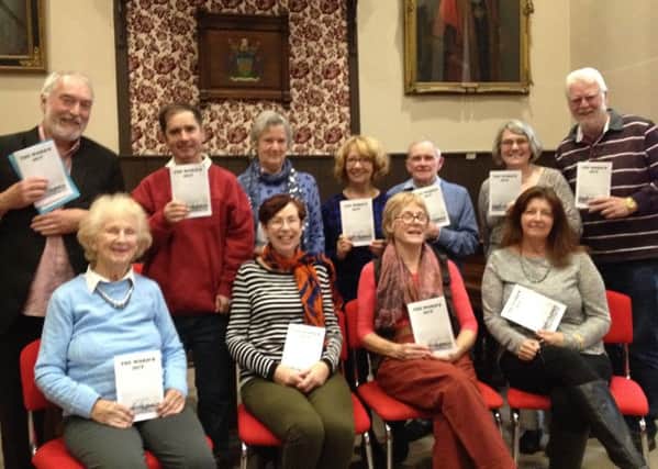 At The Words Out anthology launch at Clitheroe Library: top row, left to right  Philip Burton, Michael Carr, Jenny Palmer, Katie Swingewood, Walter Riley, Jane Brocklehurst and Dana Garrett Nadeau; bottom row  Pat Colman, Alison McNulty, Judy Sowter and Heather Jadhav.