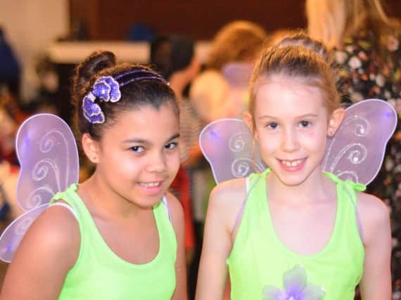 Evie and Alicia dressed as flower fairies for their debut at the Lancashire Schools Dance Festival with their classmates from Padiham Primary School.