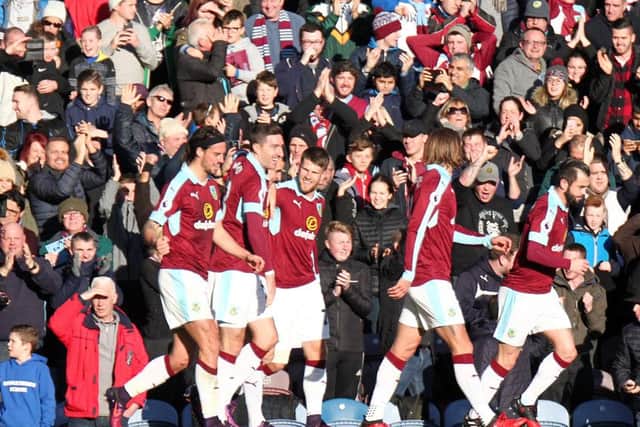 Burnley players celebrate after Dean Marney scored the opening goal