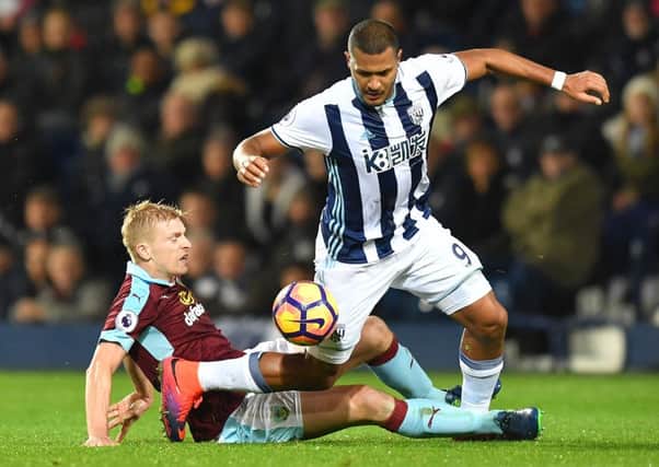 Burnley's Ben Mee fouls West Bromwich Albion's Jose Salomon Rond0nPhotographer Dave Howarth/CameraSportThe Premier League - West Bromwich Albion v Burnley - Monday 21st November 2016 - The Hawthorns - West BromwichWorld Copyright Â© 2016 CameraSport. All rights reserved. 43 Linden Ave. Countesthorpe. Leicester. England. LE8 5PG - Tel: +44 (0) 116 277 4147 - admin@camerasport.com - www.camerasport.com