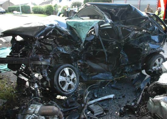 The wreckage of Matthew's car after the crash Credit: Lancashire Police.