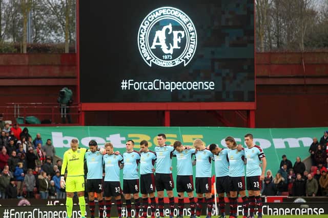 The Burnley players paid tribute to the Chapecoense team who died in a plane crash earlier this week