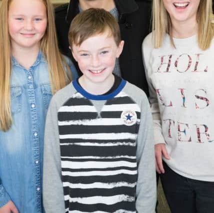 (From l-r) Maisie Dobson, Theo Holden and Megan Dobson with Jack P. Shepherd at The Mall in Blackburn (s)