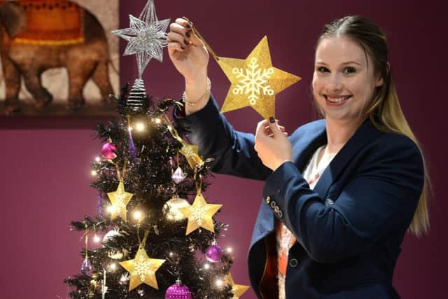 Sophie Hitchon launching the Christmas appeal with her Pendleside Hospice gold star.