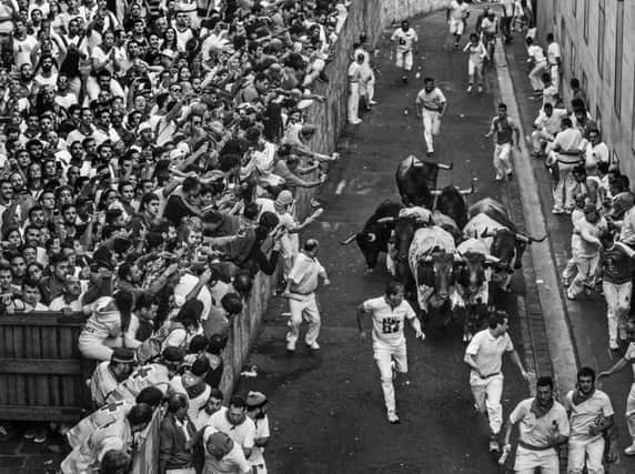 A snippet from Oliver's famed shot of the Running of the Bulls in Pamplona.