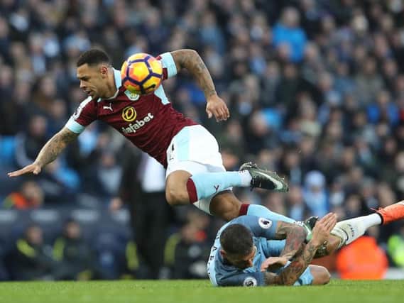 Andre Gray falls under a challenge