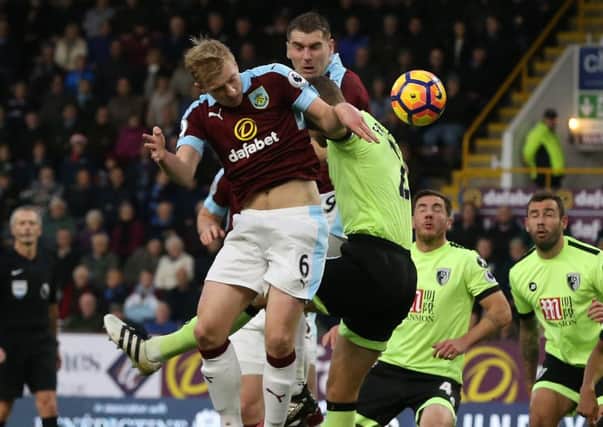 Burnley's Ben Mee beats Bournemouth's Simon Francis to the ball

Photographer Stephen White/CameraSport

The Premier League - Burnley v Bournemouth - Saturday 10th December 2016 - Turf Moor - Burnley 

World Copyright Â© 2016 CameraSport. All rights reserved. 43 Linden Ave. Countesthorpe. Leicester. England. LE8 5PG - Tel: +44 (0) 116 277 4147 - admin@camerasport.com - www.camerasport.com