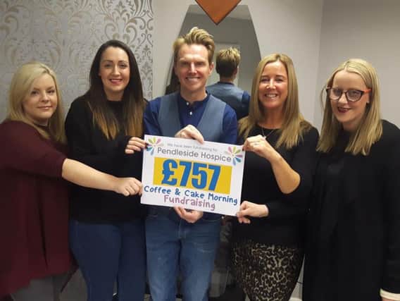 Proud of their fundraising efforts at Andy Jackson's Salon are (from left to right) Gemma Barnes, Joelle Jackson, Andy Jackson, Lisa Broxup and Katie Stubbs