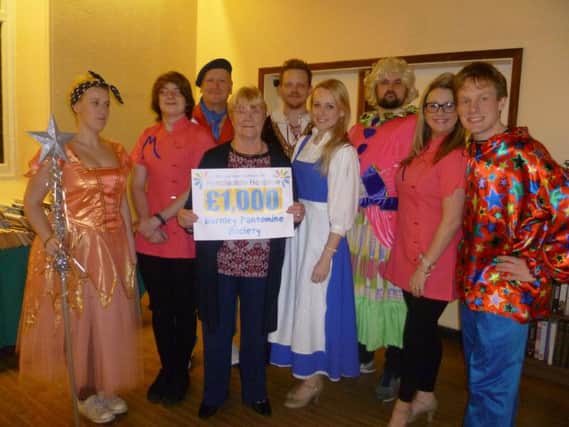 The Burnley Pantomime Society raised one thousand pounds for Pendleside Hospice.