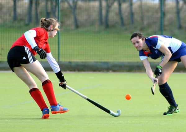Hockey action from Lytham Ladies (blue and white) v Pendle Forest, at AKS School.
Amie Knighton clears for Lytham.  PIC BY ROB LOCK
14-1-2017