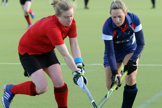 Hockey action from Lytham Ladies (blue and white) v Pendle Forest, at AKS School.
Heidi Williams heads up the wing for Lytham.  PIC BY ROB LOCK
14-1-2017