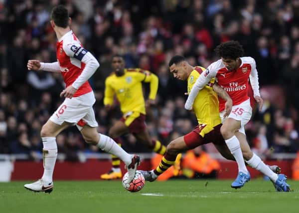 Burnley's Andre Gray battles for possession with Arsenal's Mohamed Elneny

Photographer Ashley Western/CameraSport

Football - The FA Cup Fourth Round - Arsenal v Burnley - Saturday 30th January 2016 - Emirates Stadium - London

Â© CameraSport - 43 Linden Ave. Countesthorpe. Leicester. England. LE8 5PG - Tel: +44 (0) 116 277 4147 - admin@camerasport.com - www.camerasport.com