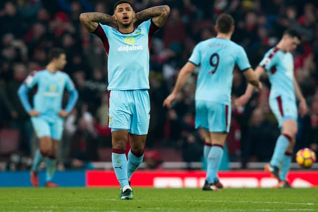 Andre Gray feels the pain of defeat