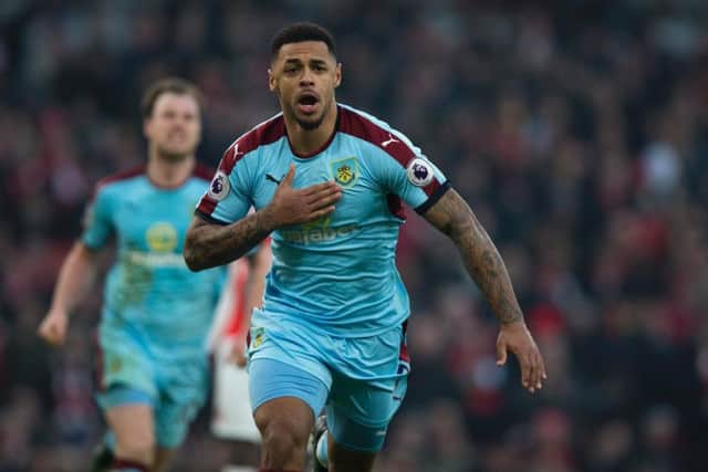 Andre Gray celebrates scoring from the spot