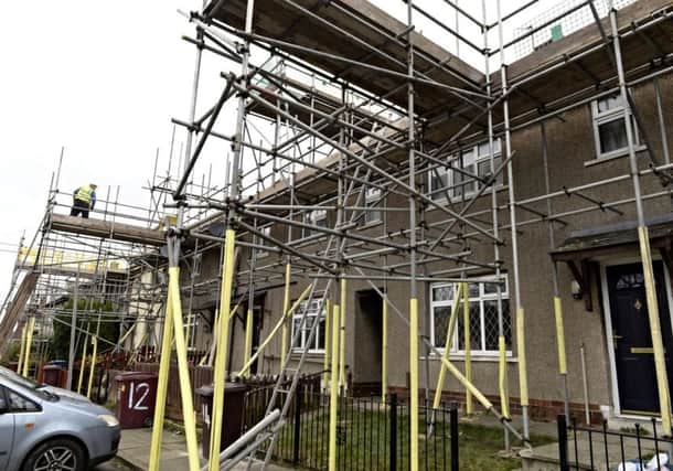 Properties being renovated on Downham Grove, Brunshaw, Burnley
