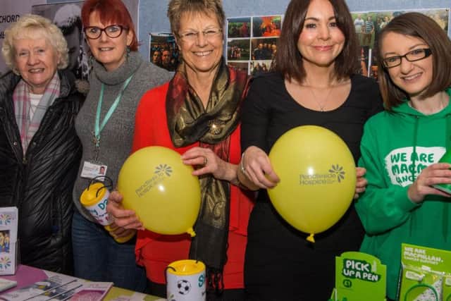 Charity fund raisers get to work at Simmy Day in Padiham, held in honour of well known son of the town, Martin Simm, who died in October after  a brave battle against cancer.