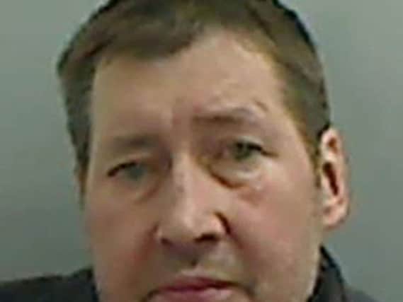 Michael Dunn, 57, from Redcar, knocked through the wall behind his fridge to create a cavity which he used to hide the runaway girl from the police.