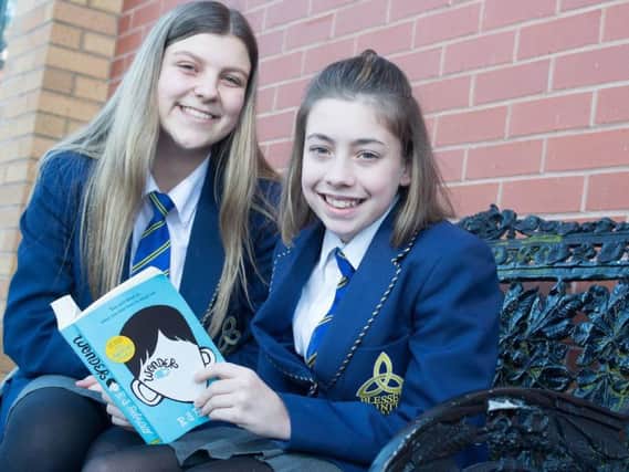 Daisy (right) with her reading mentor Alice.