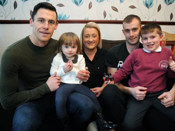 Footballer Billy Priestley meets the Askew family, who are mum and dad Gillian and Stewart and children Jake and Millie, for the first time since he dashed to the rescue after Millie suffered a fit.